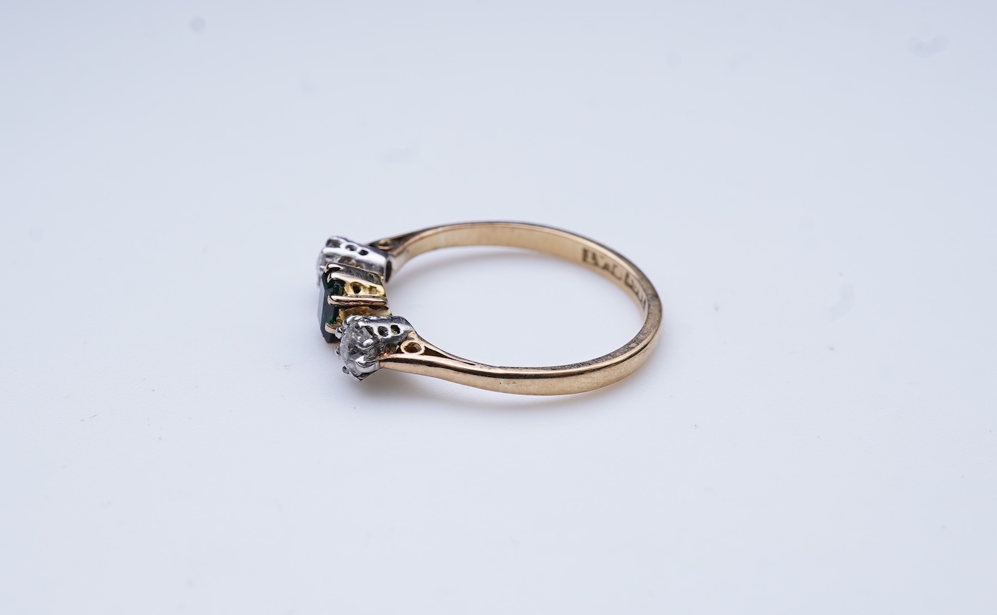 A tsavorite and diamond ring